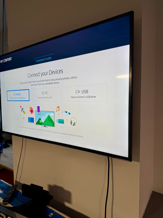 Samsung 55" 4K UHD TV — Meeting Room Screen